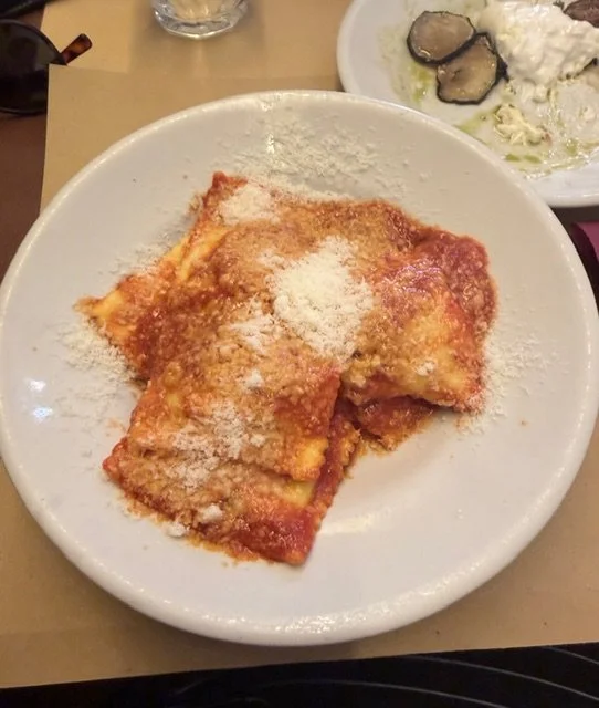 Ravioli with tomato sauce and grated cheese at Trattoria Etruria 39 in the San Giovanni neighborhood of Rome, Italy.
