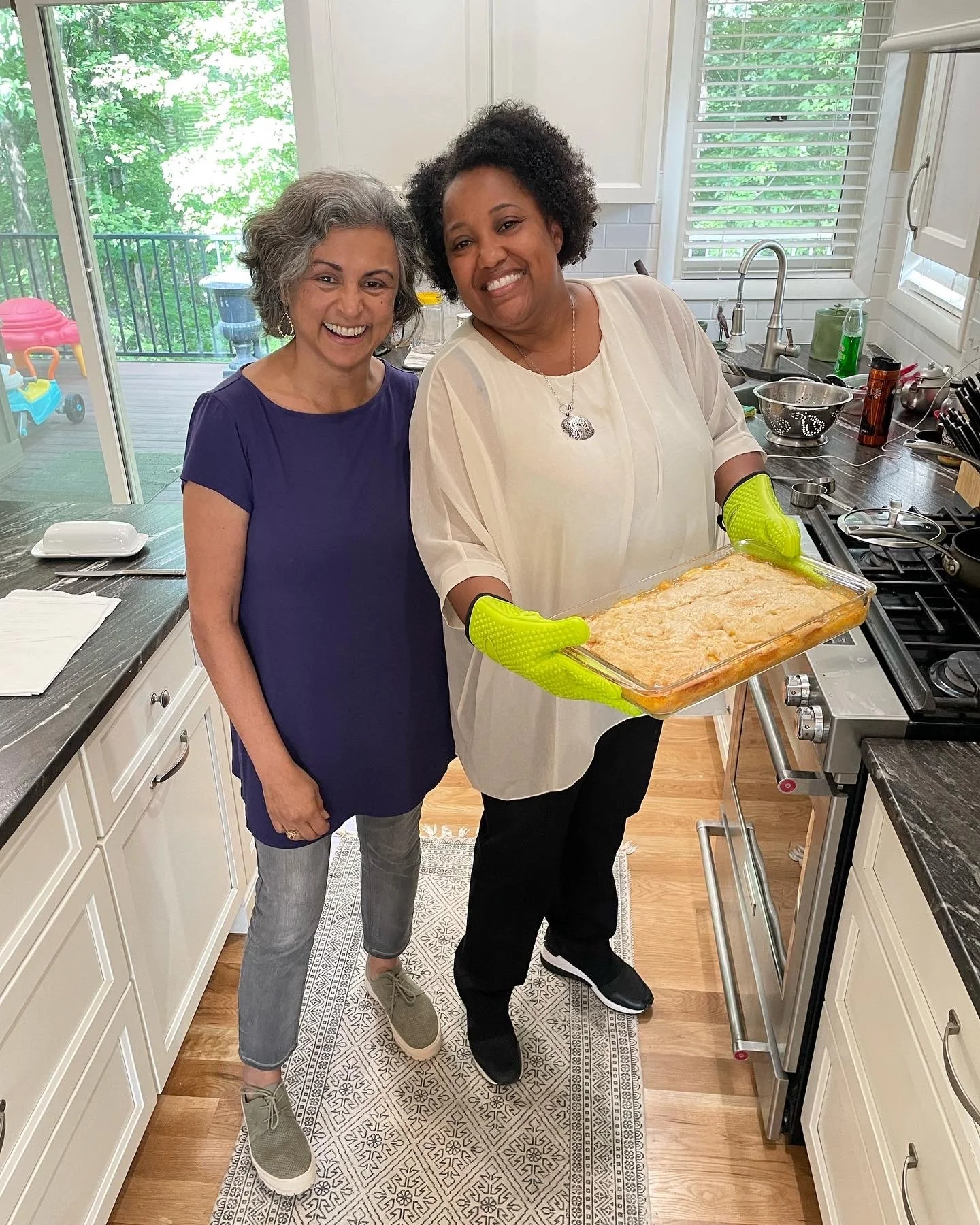 Cassandra Loftlin baking in Nina's kitchen.JPG