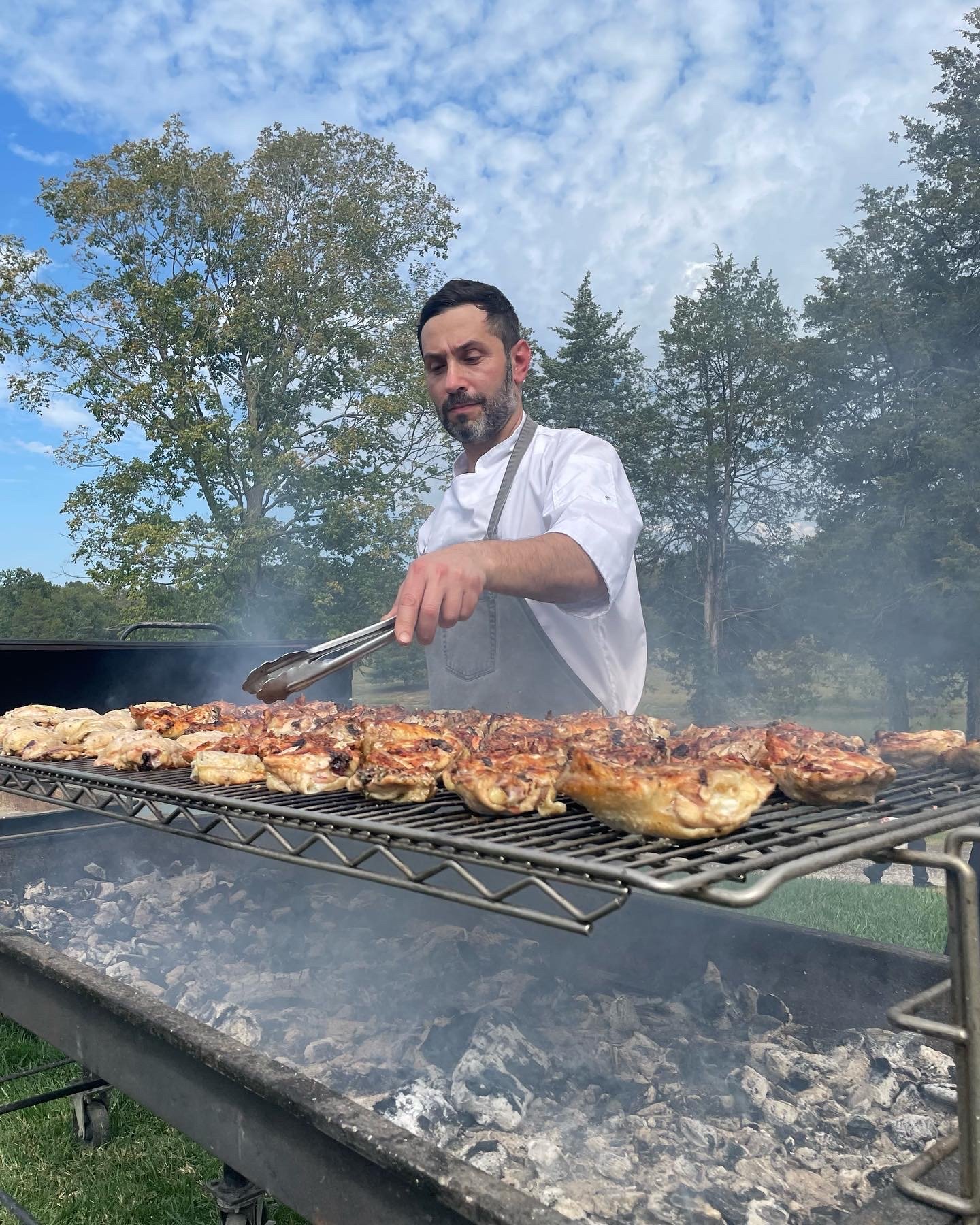 Chef Coco Carreno at the grill.JPG