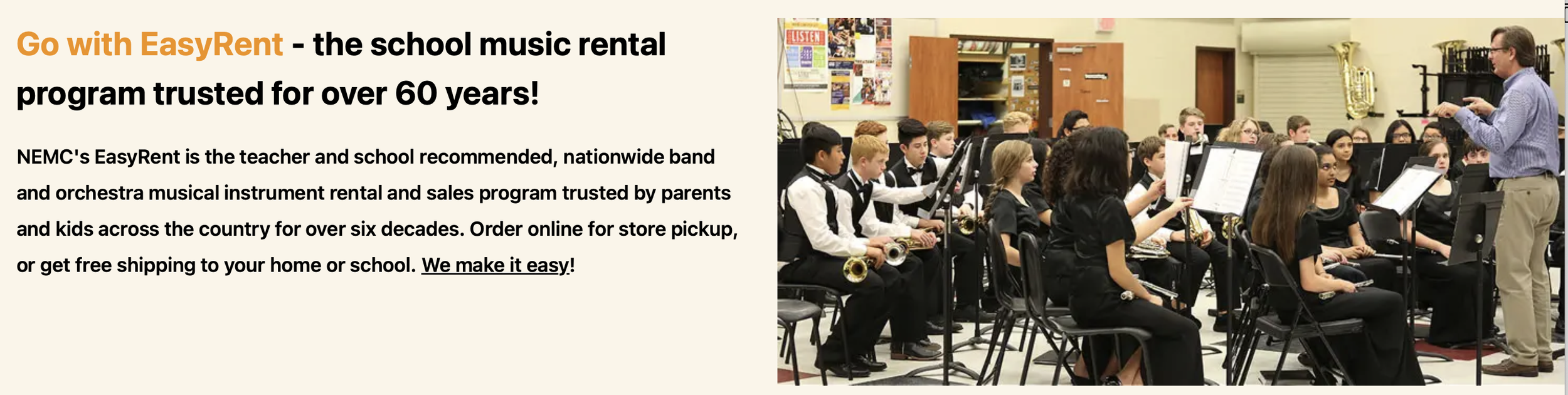 Young students in black and white formal attire sitting in chairs, holding musical instruments like saxophones and clarinets, with a music teacher standing in front of them conducting or instructing, in a classroom or band room setting with musical instruments and posters on the walls.