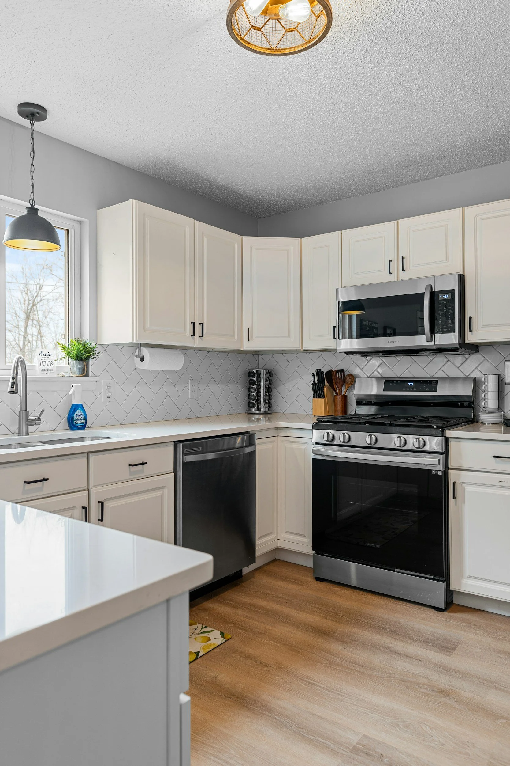 Furnished shared kitchen with modern appliances