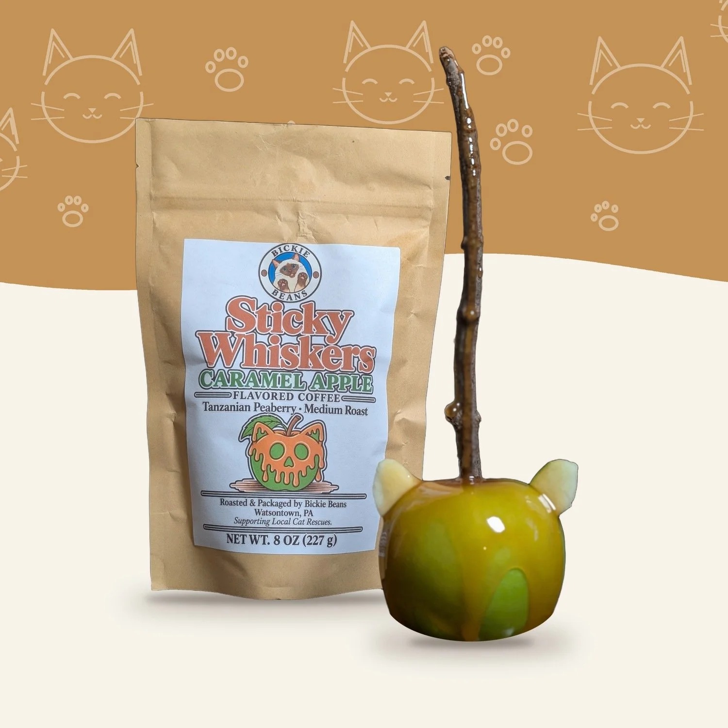 Sticky Whiskers Caramel Apple flavored coffee by Bickie Beans, 8 oz bag beside a cat-ear caramel apple