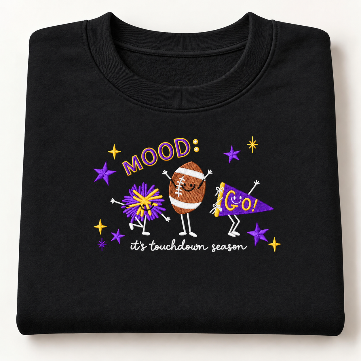 Black folded sweatshirt with touchdown embroidery.png