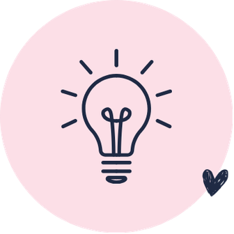 Icon of a lightbulb with rays and a small heart in the bottom right corner on a pink circular background.