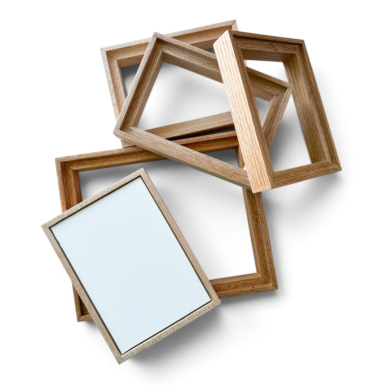 Handcrafted hardwood floating frames made by artist Amy Remling.