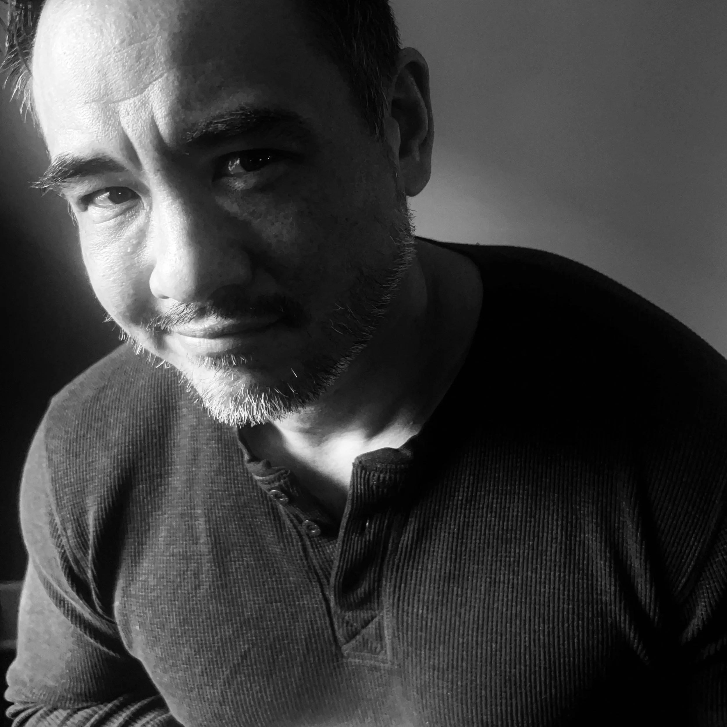 Black-and-white portrait of Vincent Straszewski.