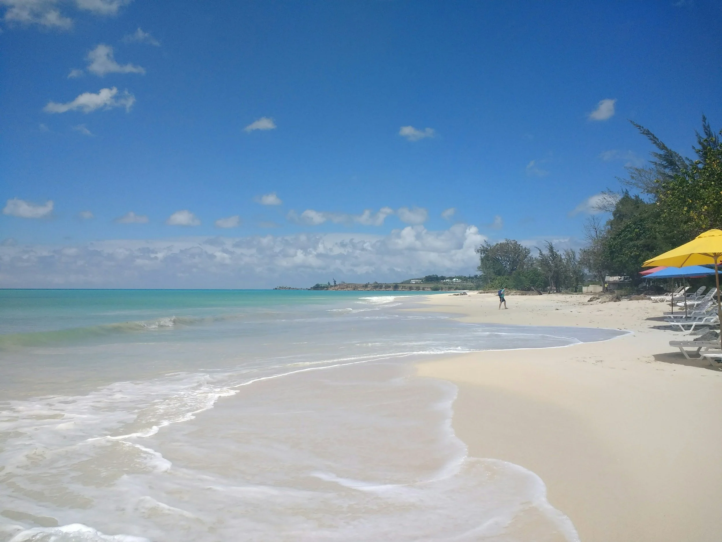 White sand beach and turquoise Caribbean water in Antigua and Barbuda