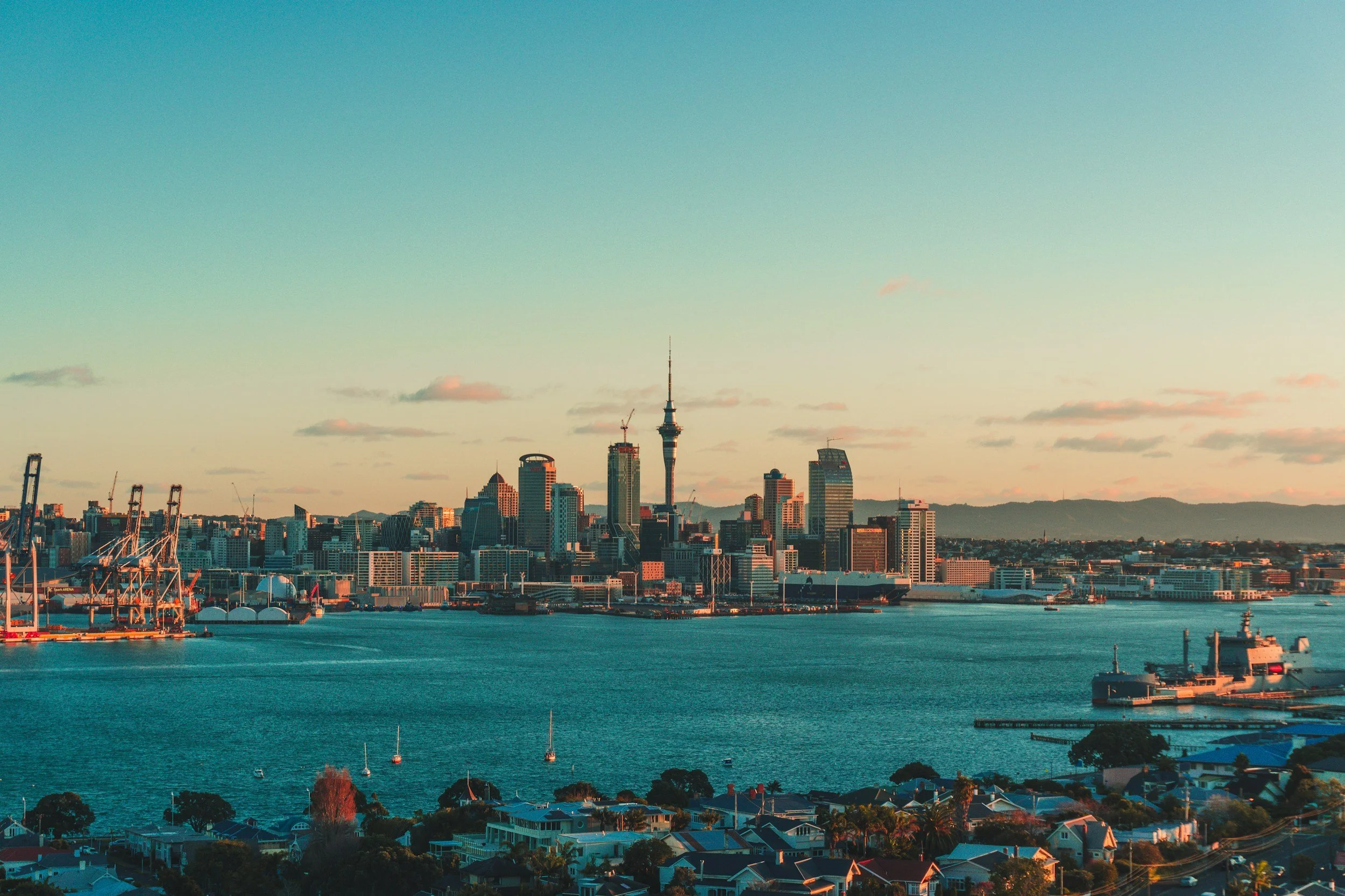 Auckland waterfront and skyline at sunset, New Zealand