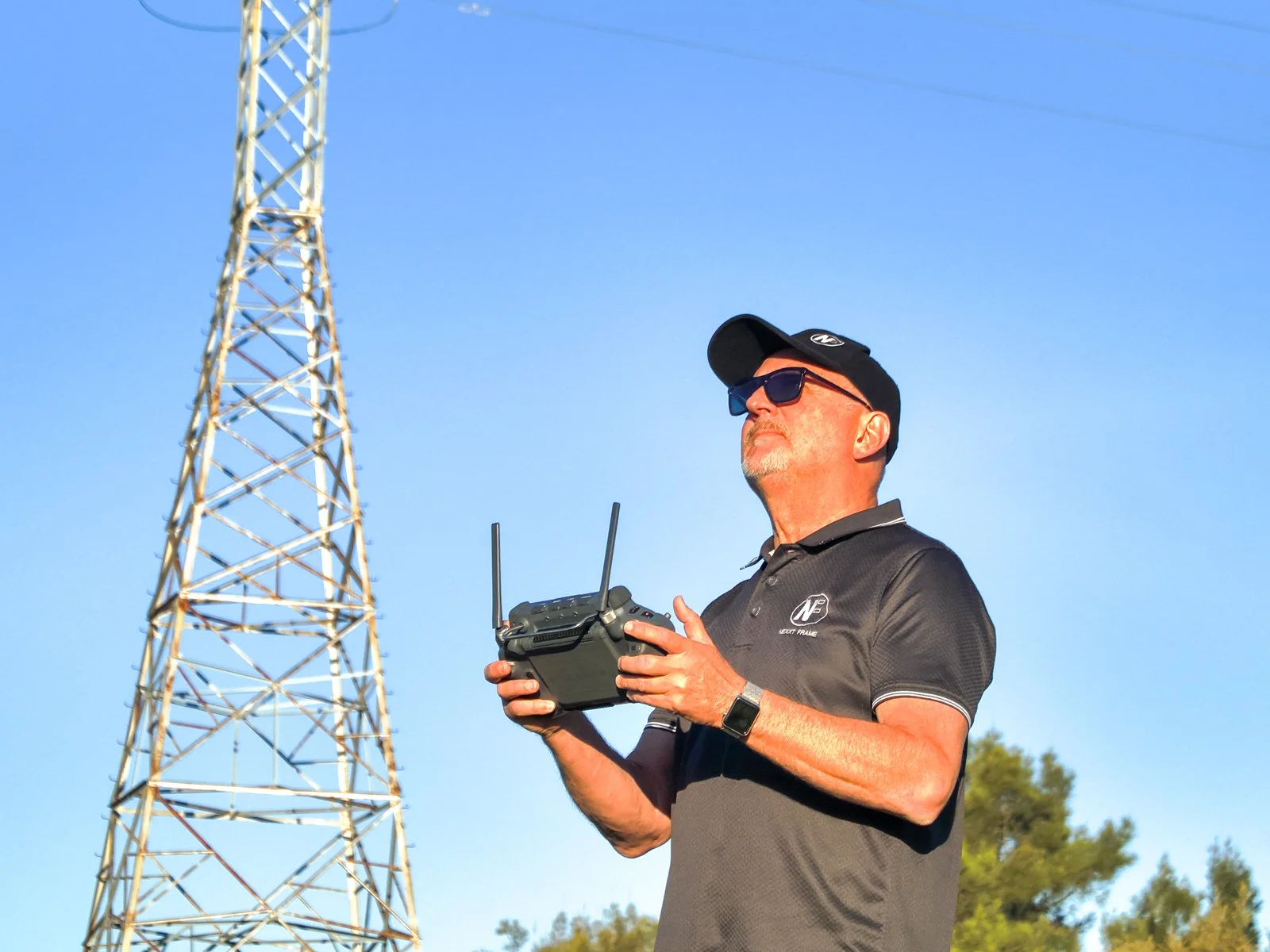 Gary testing drone zoom and thermal imaging capabilities on power lines in Western Australia