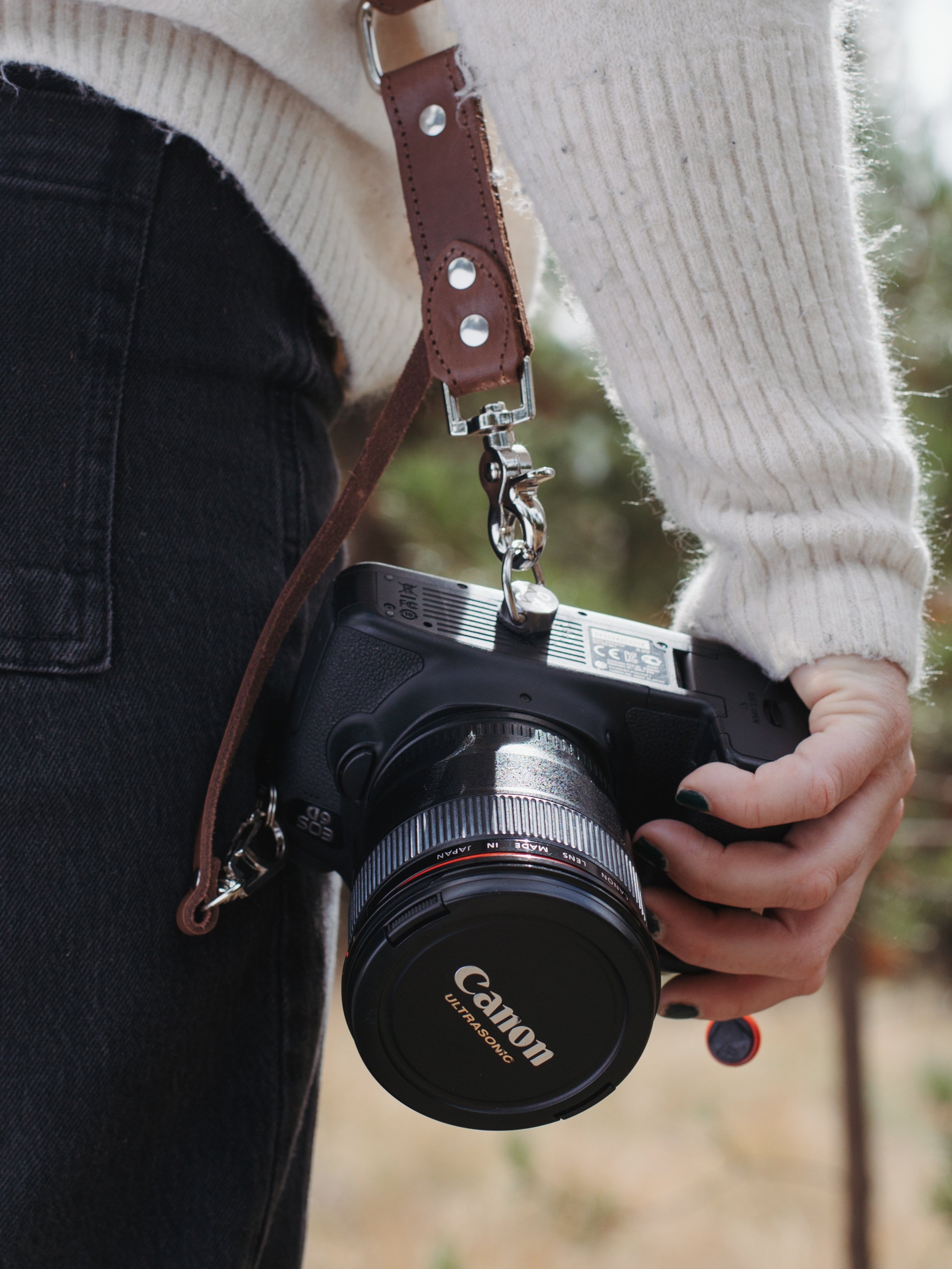 photographer holding a canon camera