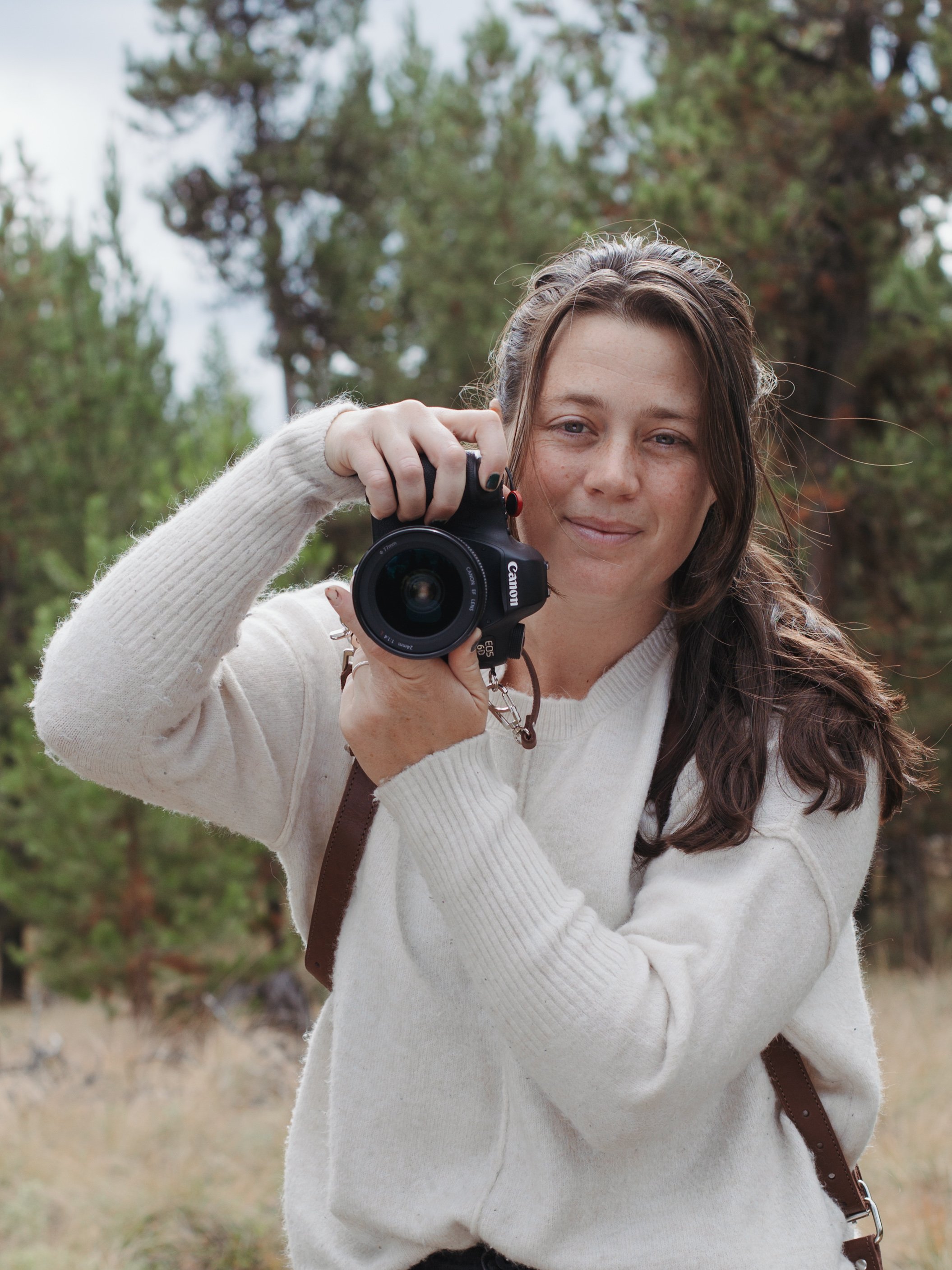 fun photographer holding camera
