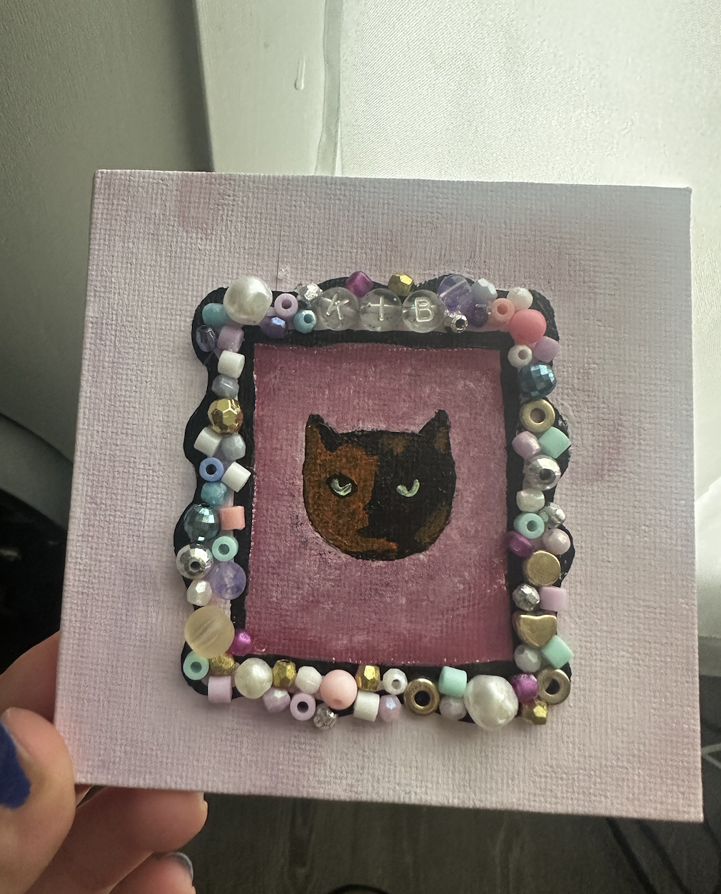 Mini portrait of my cat, Kibby with a beaded 'frame'