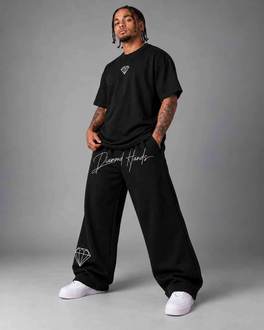 Black Diamond Hands flare sweatpants with script on the thigh