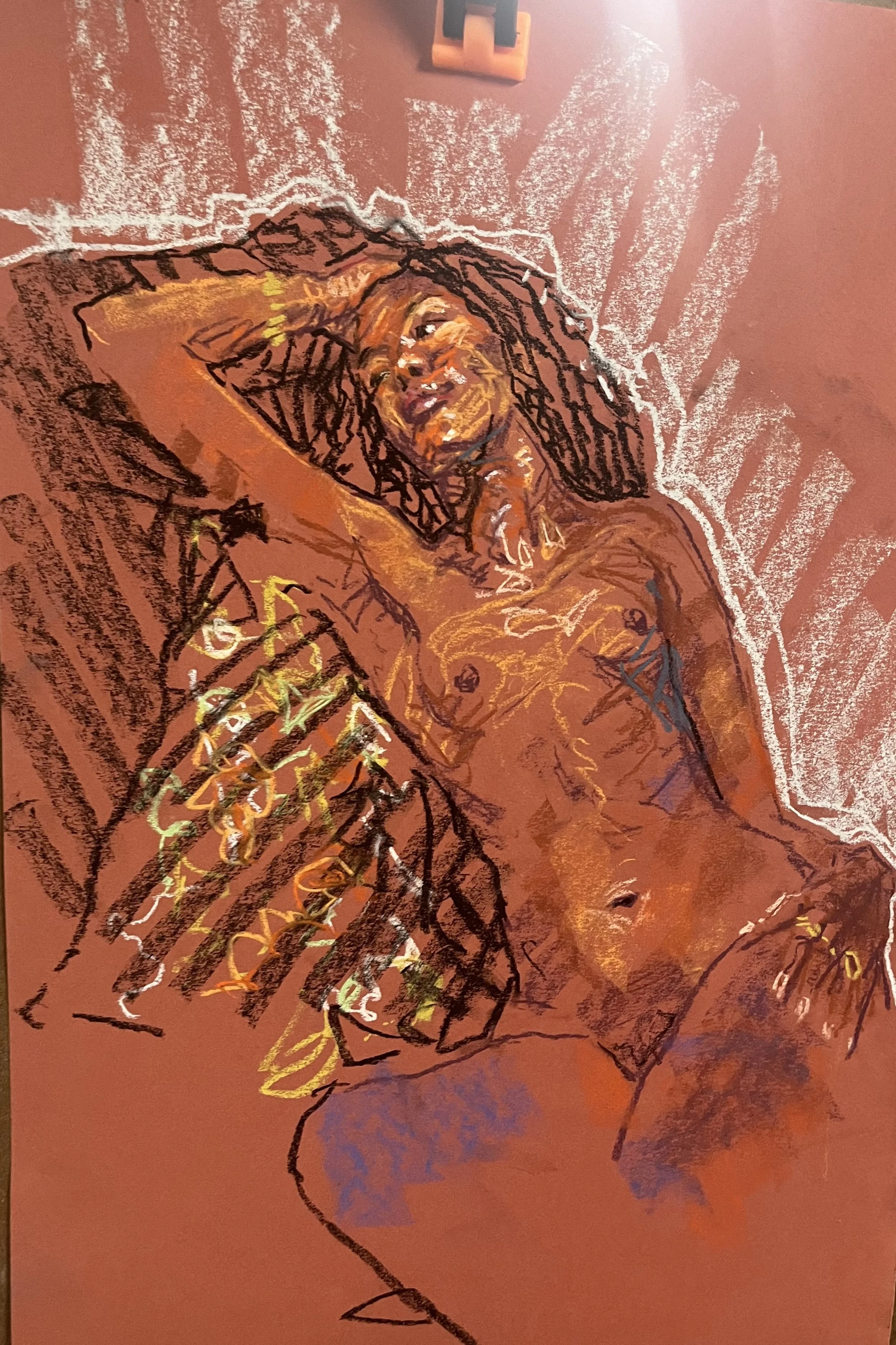 A colorful drawing of a woman with long braids, resting her head on her hand, with a relaxed expression. The background is shaded in reddish tones with white chalk-like accents.