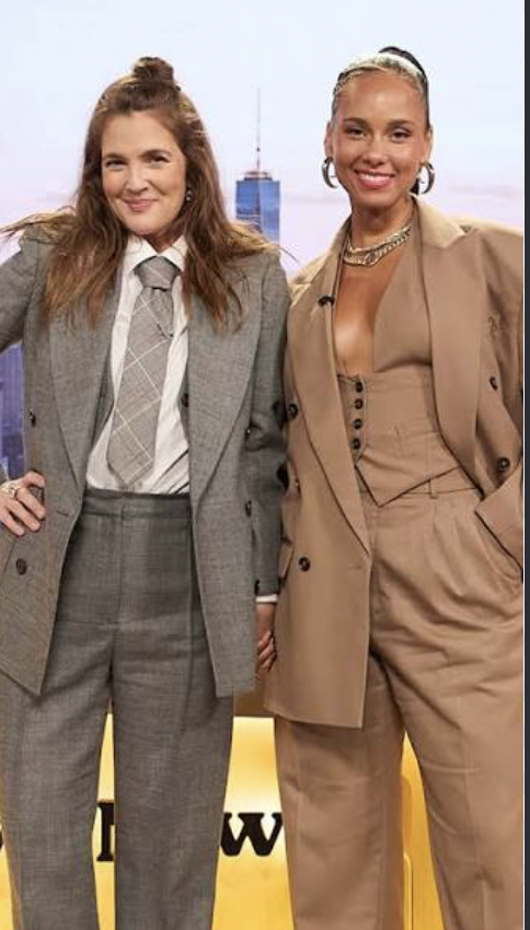 Drew Barrymore and Alicia Keys posing together on The Drew Barrymore Show set