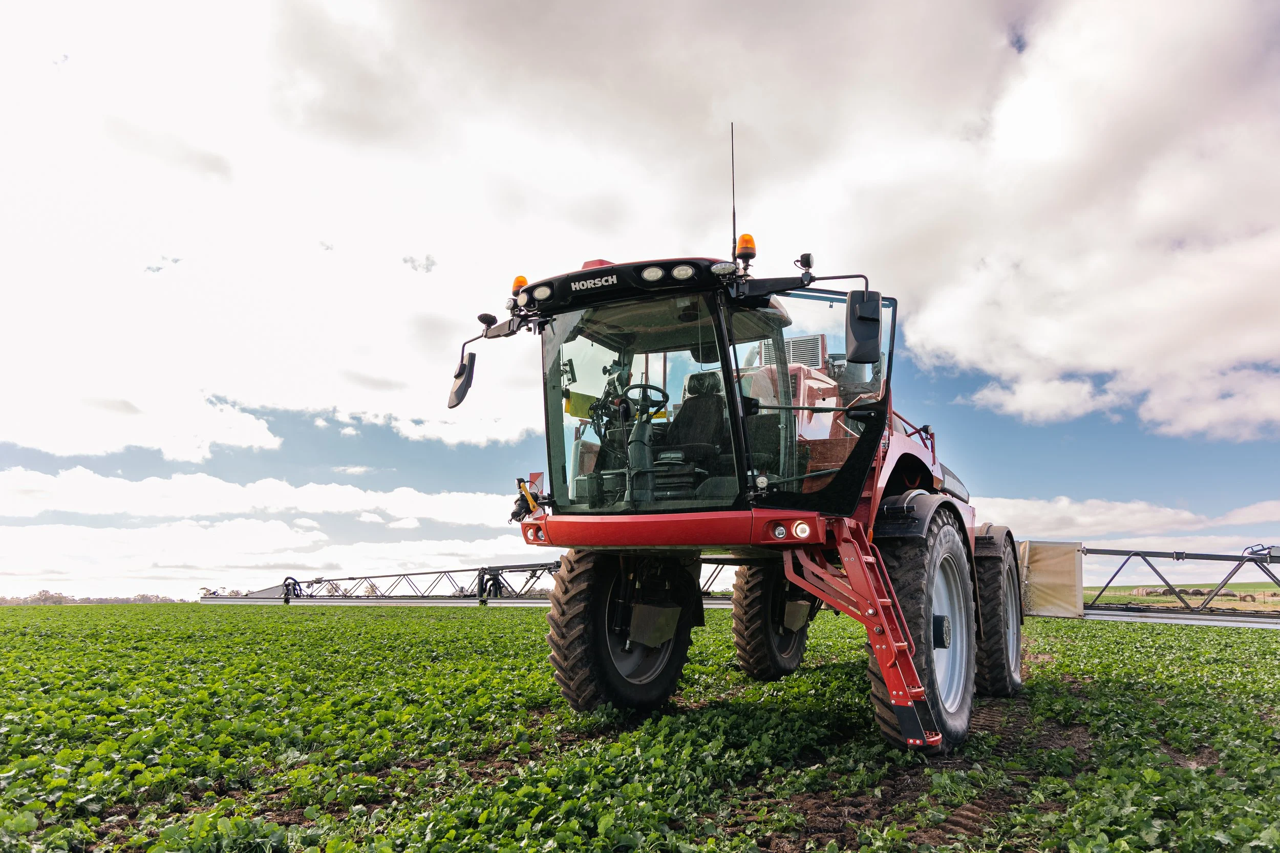 HORSCH Leeb SP sprayer in a green crop with boom unfolded