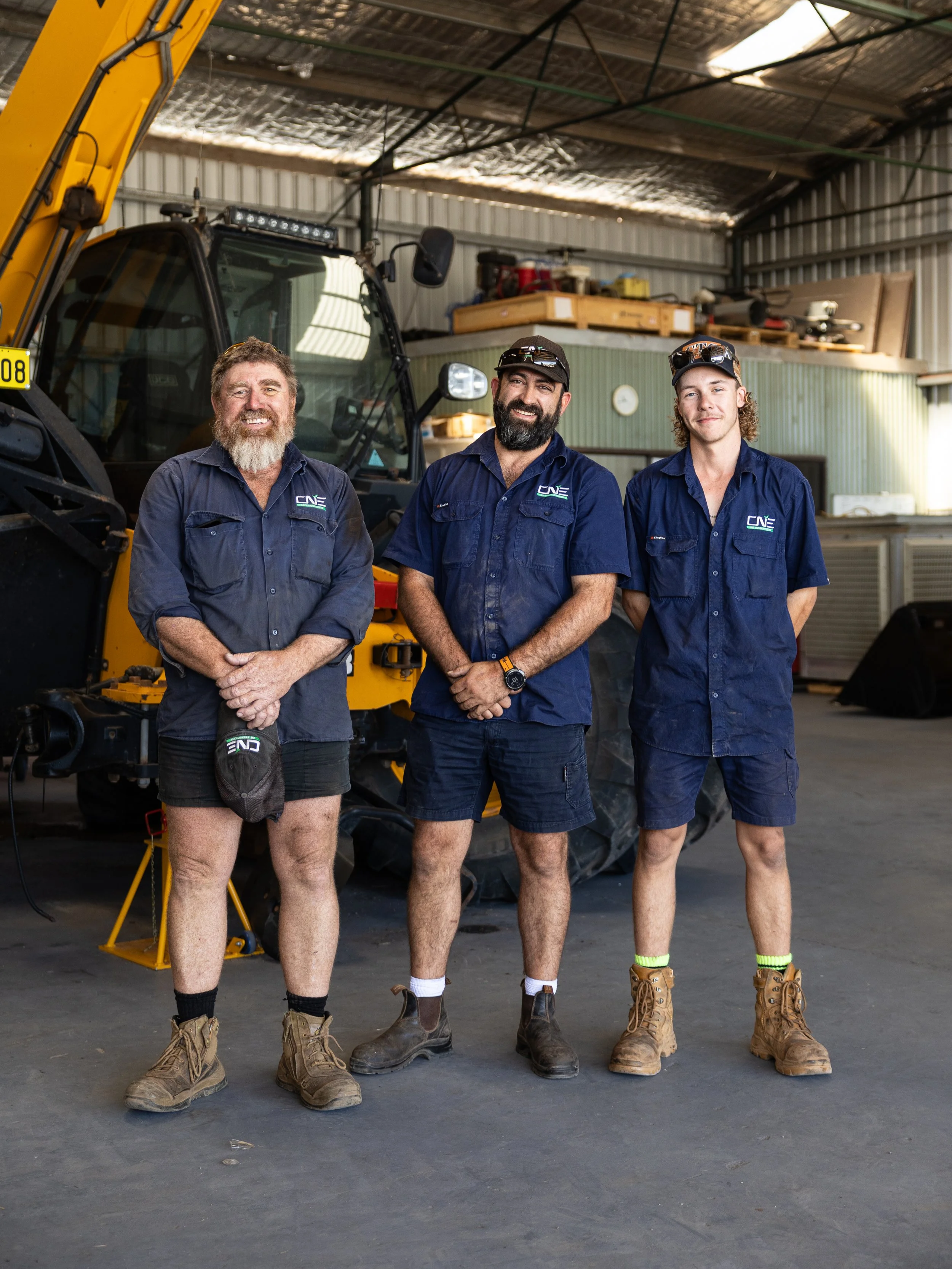 CNE Ag Innovations service technicians in the workshop with JCB machinery