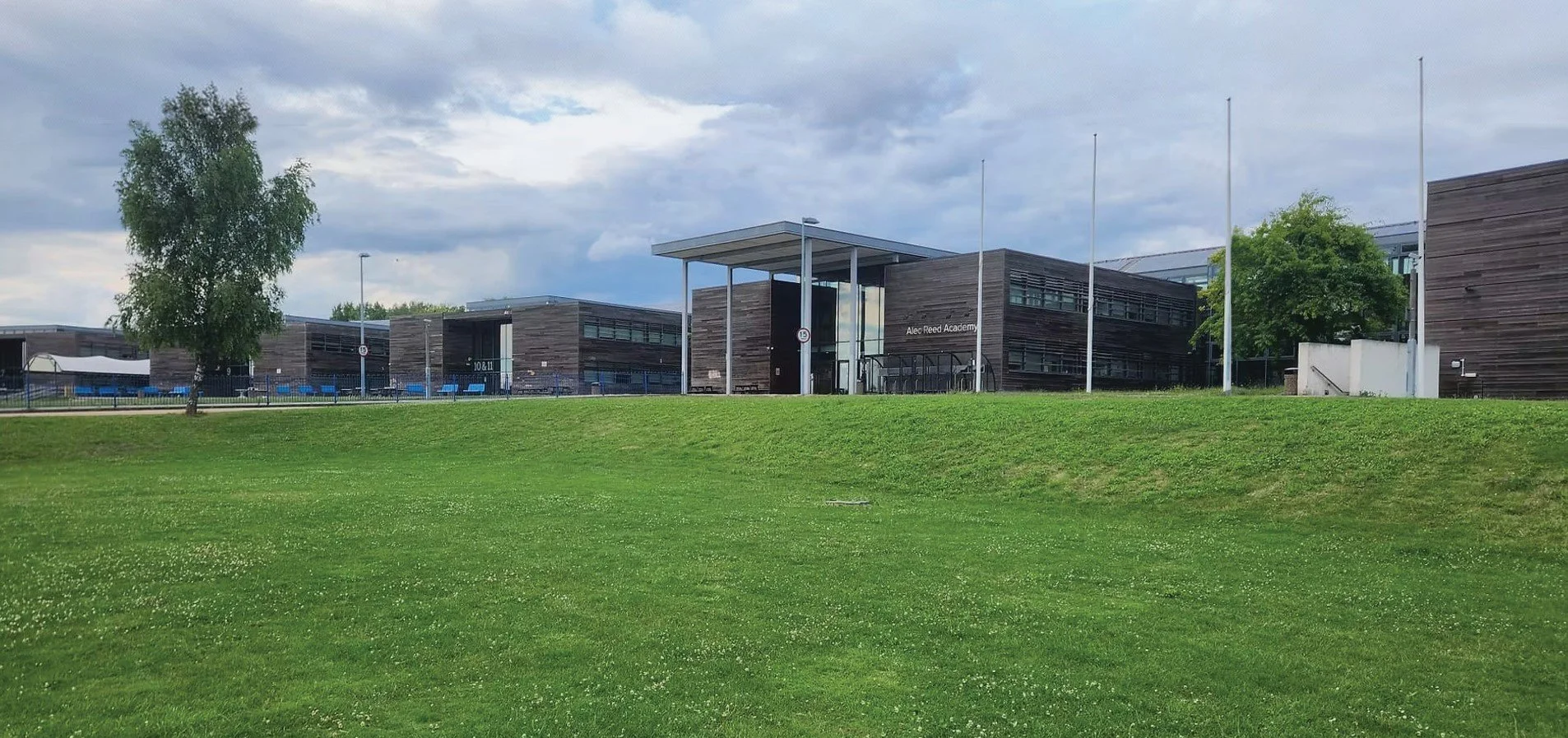 Shot of the outside of Alec Reed Academy where STA teach
