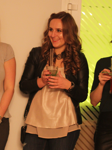 Kat, founder of Mellow Office, at a social gathering.