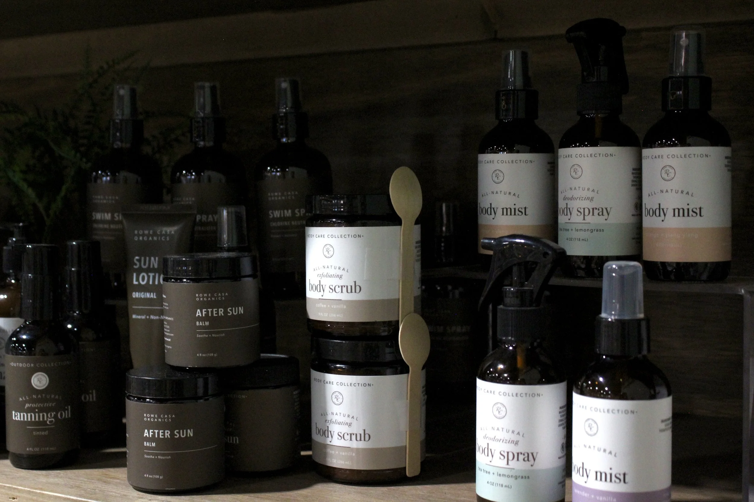 Body Care Collection exfoliating body scrub, tanning oil, and body products.