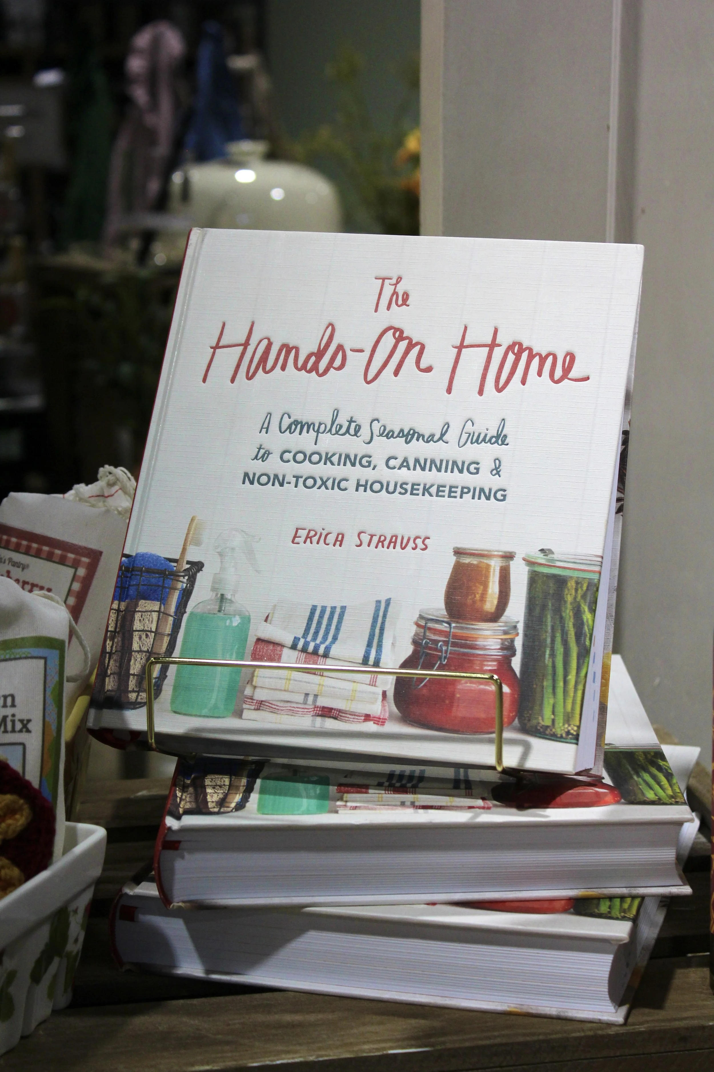 Cookbook titled "The Hands-On Home" by Erica Strauss, fat Burley Sustainable General Store in West Jefferson, NC.