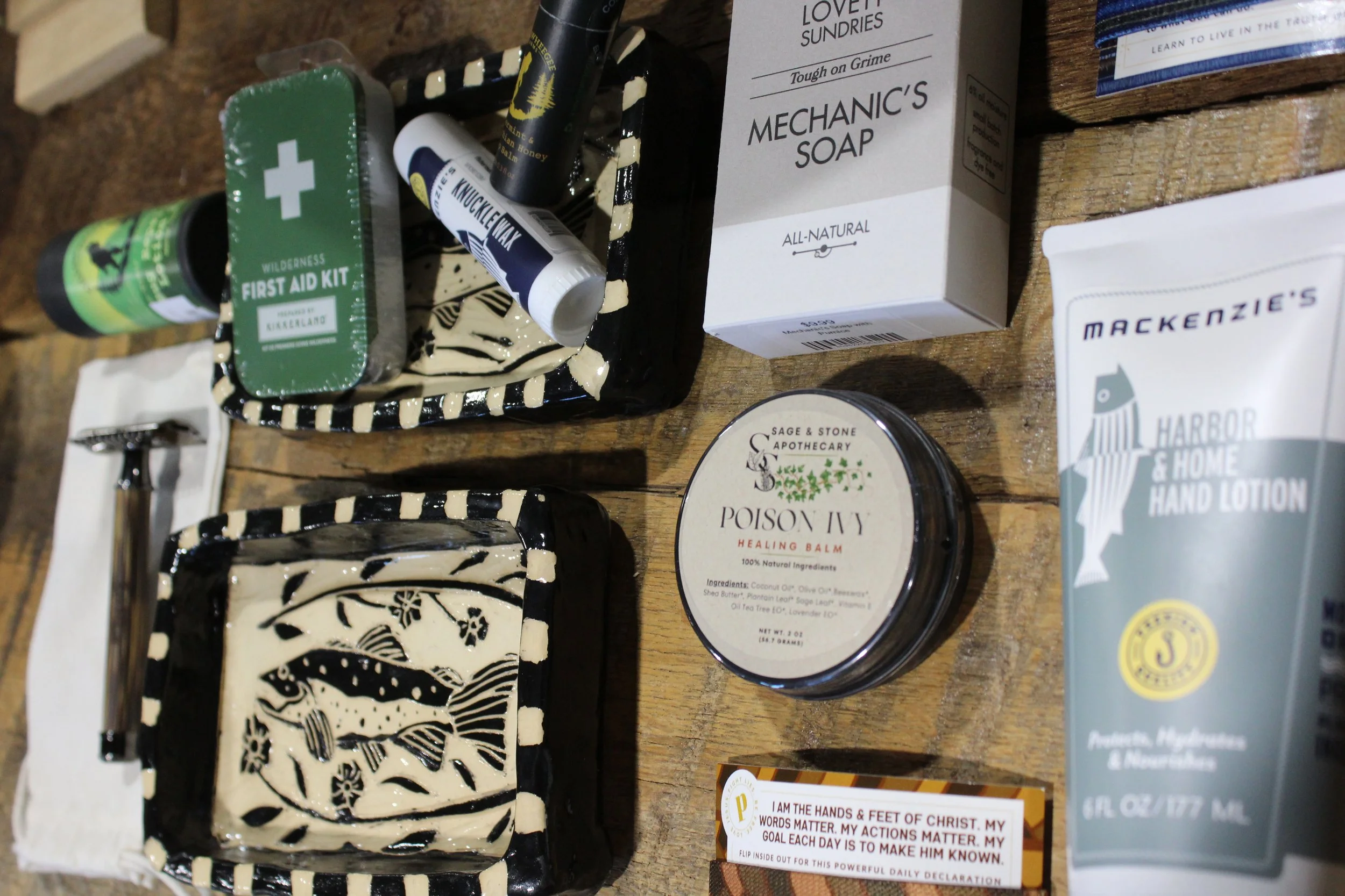 Assorted personal care and health products at Burley Sustainable General Store in West Jefferson, NC., including soap, hand lotion, first aid kit, and soap boxes.