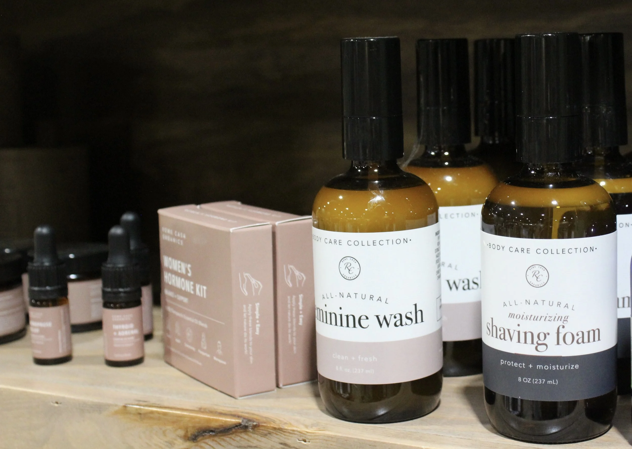 Body Care Collection and Rowe Casa exfoliating wash and shaving foam, along with smaller containers of skincare items, available at Burley Sustainable General Store.