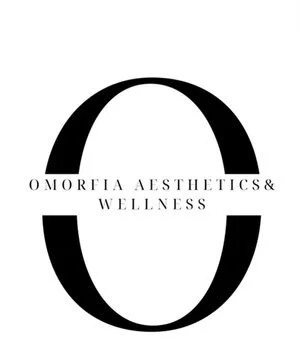 Logo with a large black oval containing the text 'OMORFIA AESTHETICS & WELLNESS' inside.