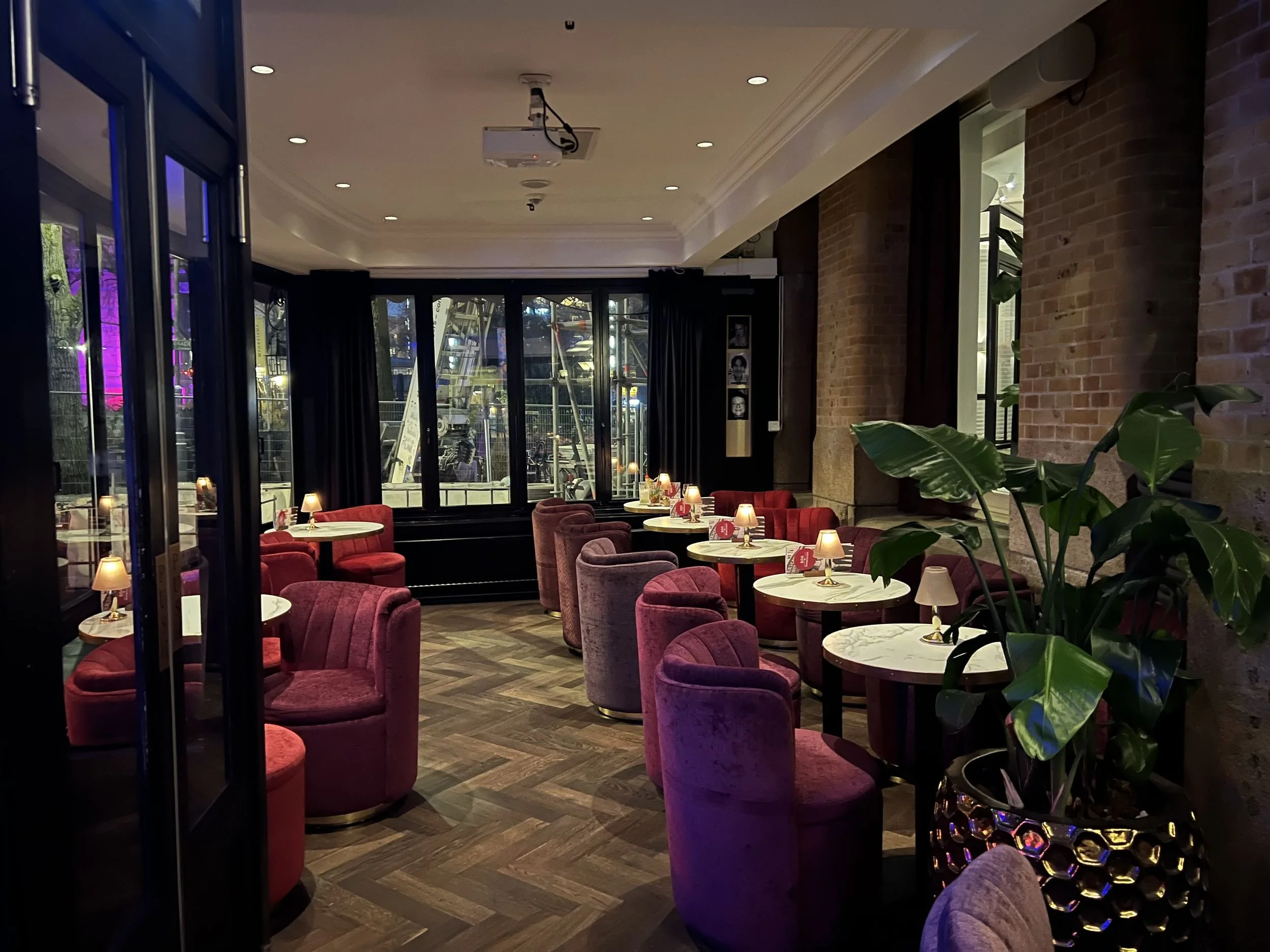 Velvet lounge chairs in an Amsterdam venue for corporate drinks