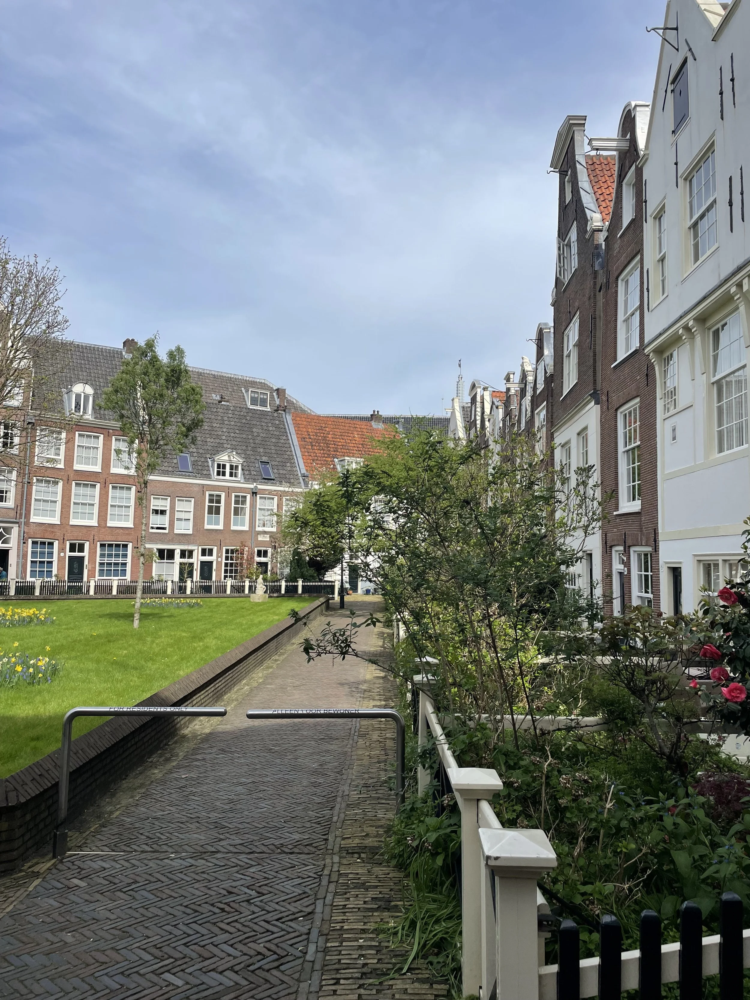 Hidden almshouse courtyard garden in central Amsterdam