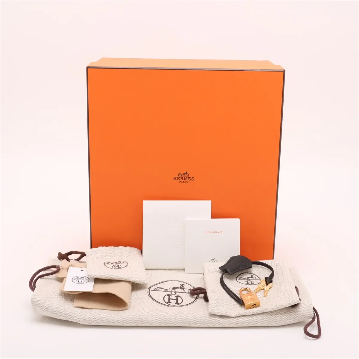 Hermes-2025-Kelly_25-Togo_Black-GHW (12).webp