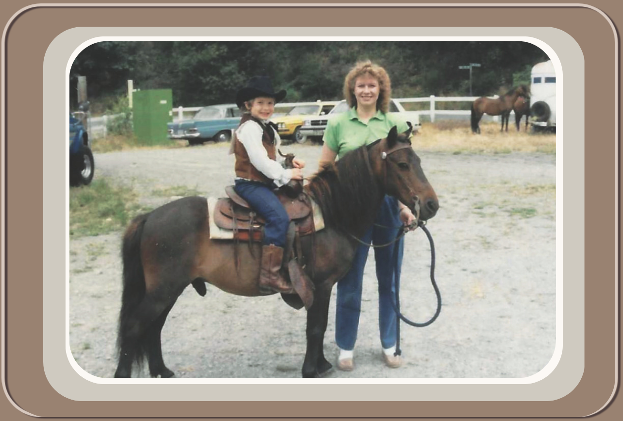 Linda Anne Starr leading a pony with her daughter riding. Linda Anne Starr | Training the Horse's Beautiful Mind