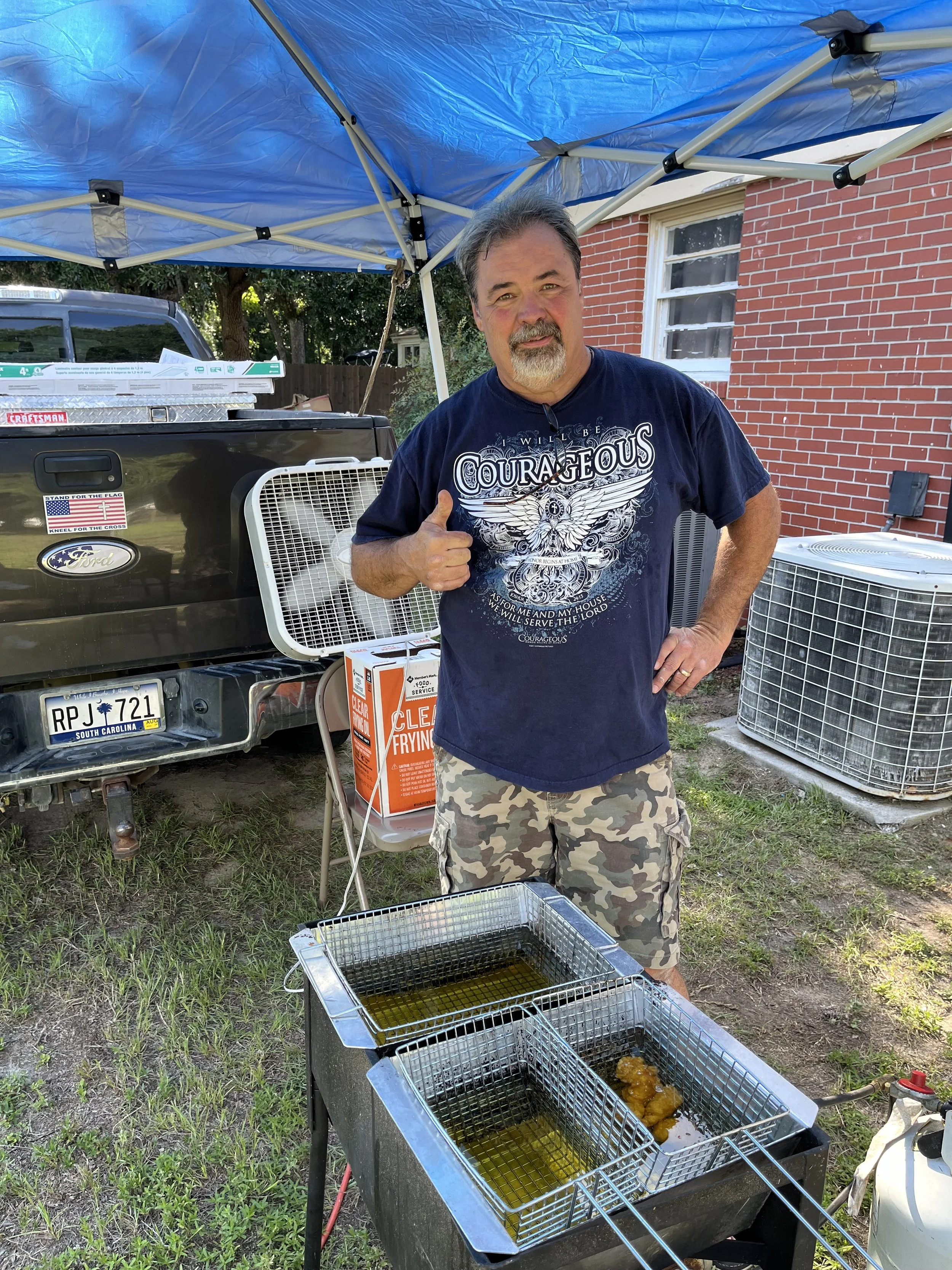 Volunteer participating in Sunday service at Refuge Church