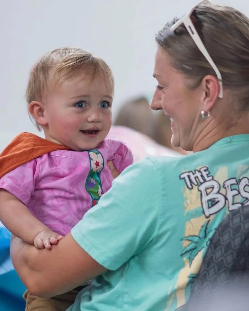 A mom and child participating in Refuge Kids during Sunday service