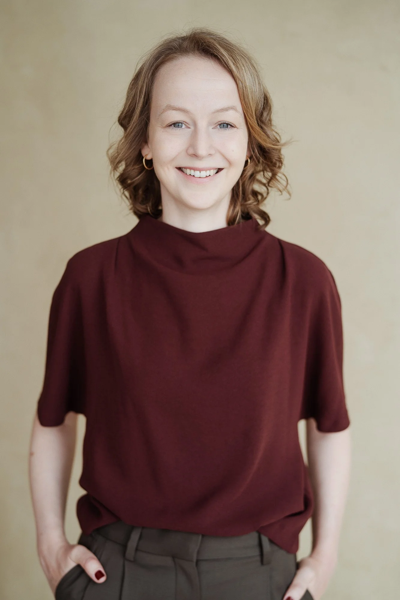 Professional headshot of human-centric leadership coach Katharina Gerhardt
