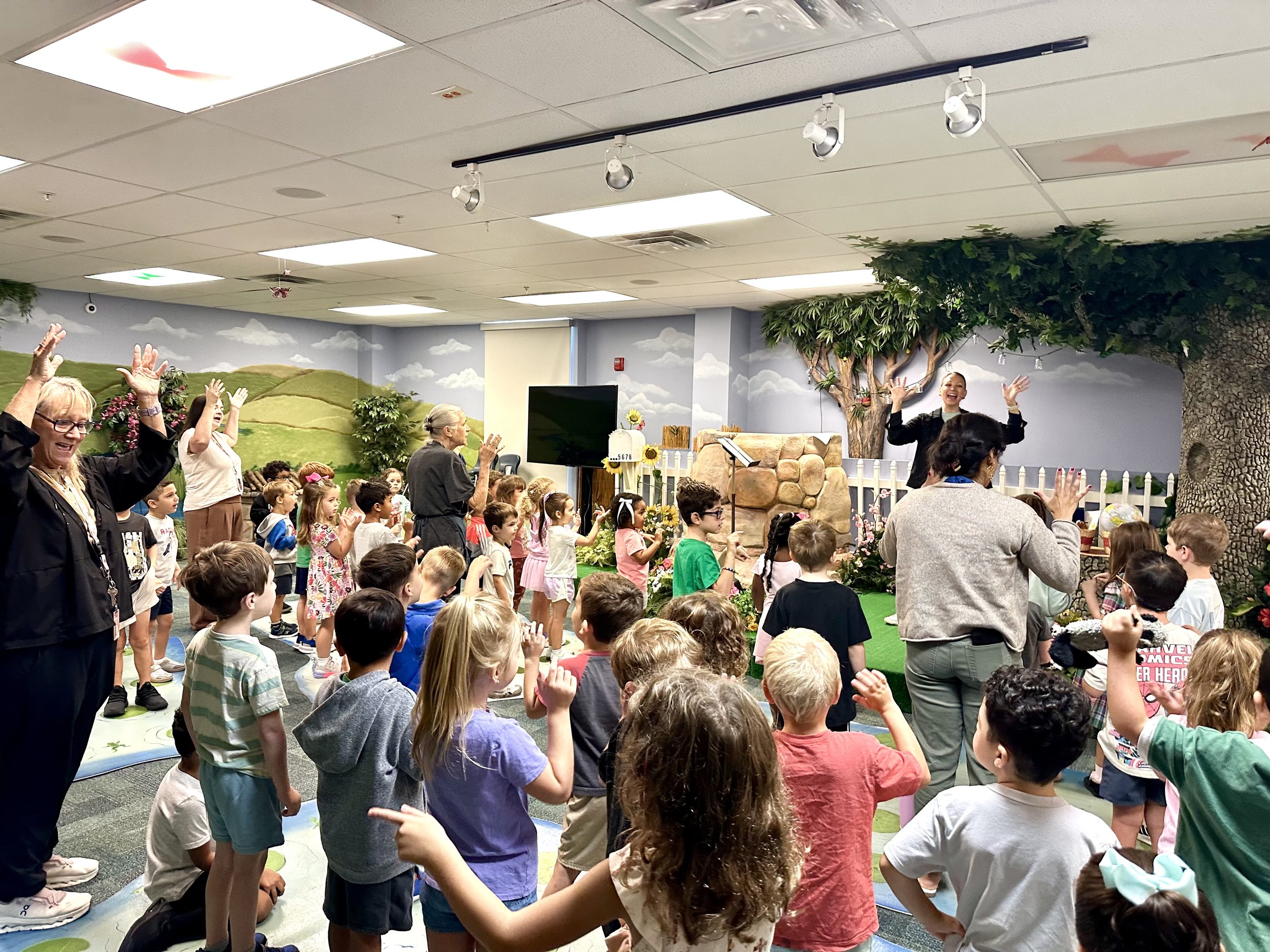 Kindergarten students and families at a school gathering at Cooperative School at Northland in Longwood, FL