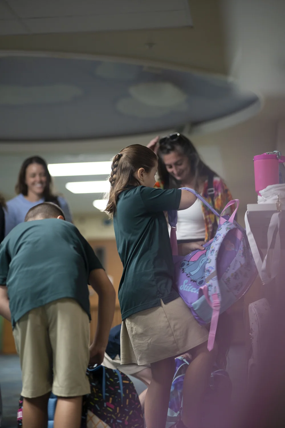 Grade school students arriving for their on-campus day at Cooperative School at Northland in Longwood, FL