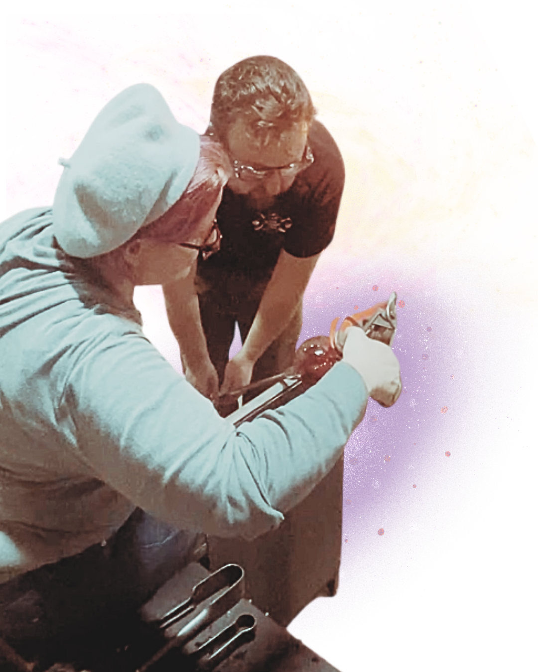 Two people working together, one in a gray hoodie and white beanie, and the other in a black shirt, are examining or handling an object, with a colorful, cosmic galaxy background.