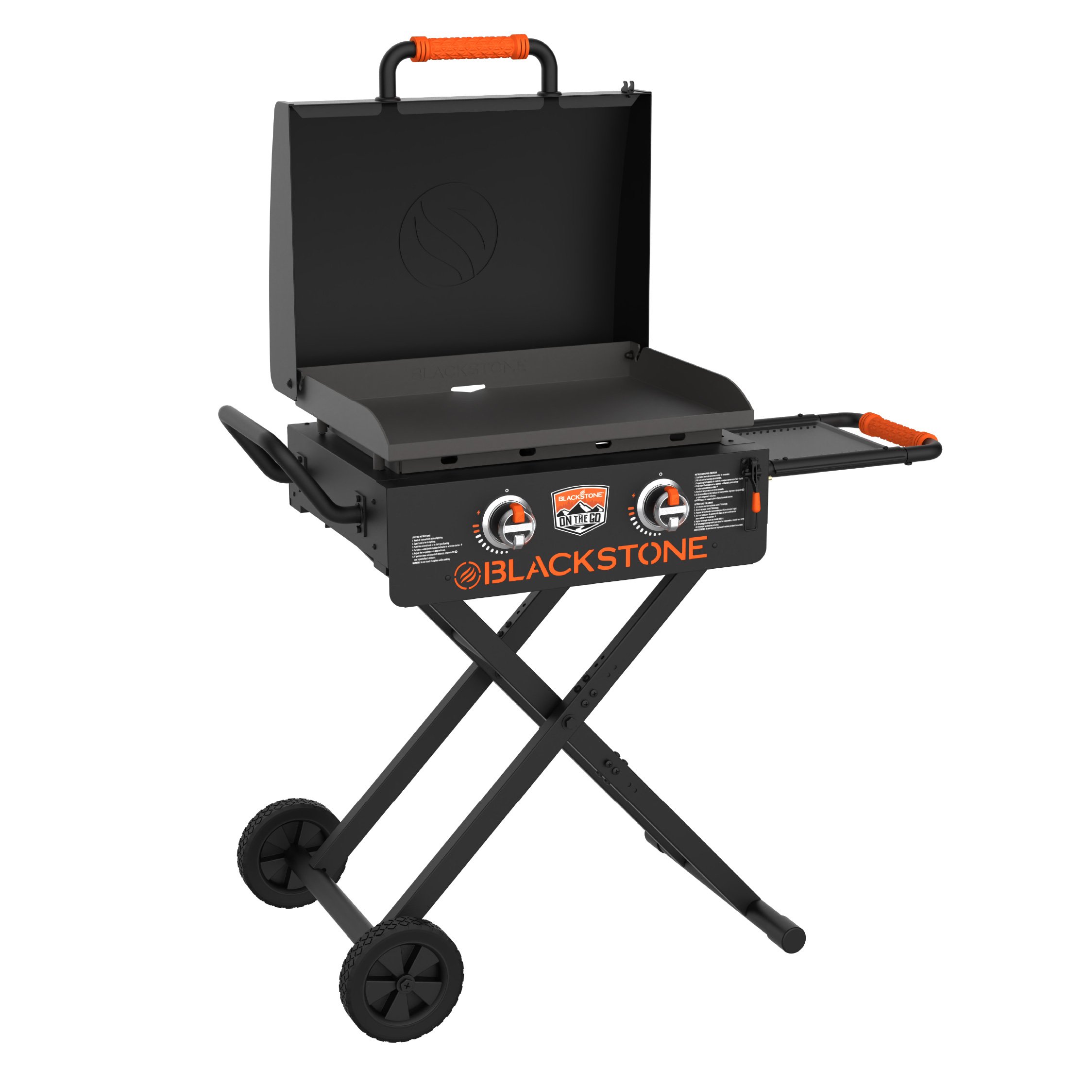 A black portable pizza oven with orange handles and wheels, on a black stand with X-shaped legs.
