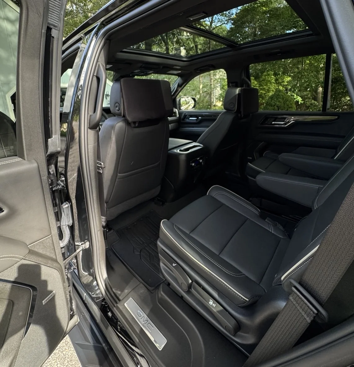 GMC Yukon refined and protected by 3LB, featuring paint refinement, ceramic protection, wheel, engine compartment, interior, and finished vehicle details.