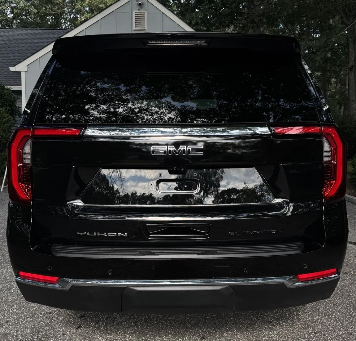 GMC Yukon refined and protected by 3LB, featuring paint refinement, ceramic protection, wheel, engine compartment, interior, and finished vehicle details.