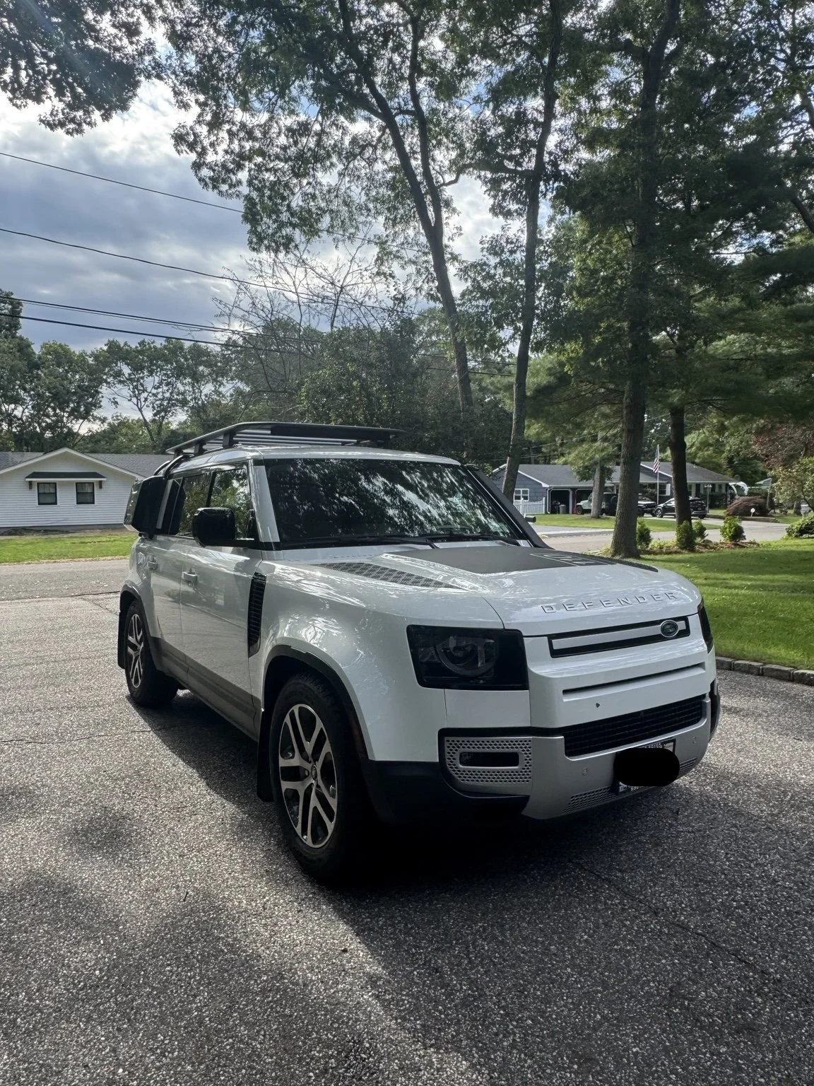 Land Rover Defender refined and protected by 3LB, featuring paint correction, exterior details, wheels, engine compartment, interior, and finished vehicle details.