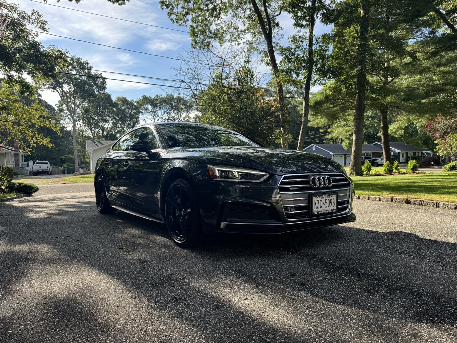 Black Audi A5 photographed after exterior refinement.