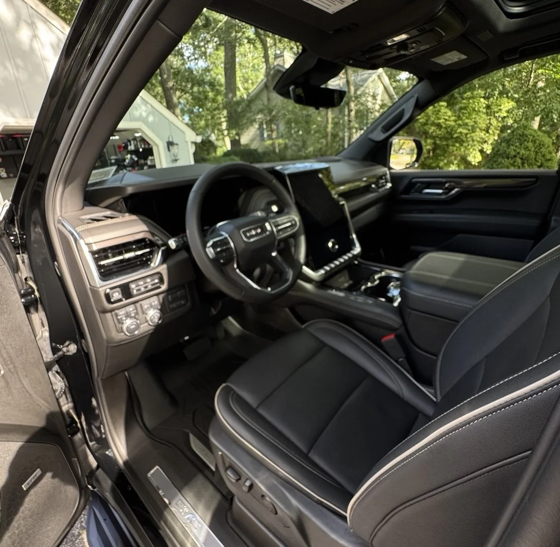 GMC Yukon refined and protected by 3LB, featuring paint refinement, ceramic protection, wheel, engine compartment, interior, and finished vehicle details.