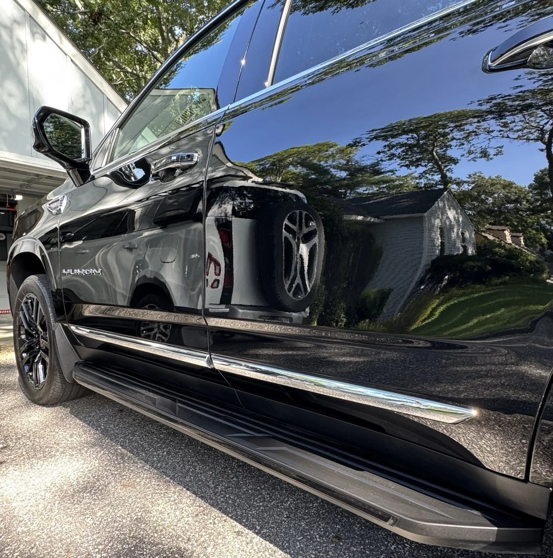 GMC Yukon refined and protected by 3LB, featuring paint refinement, ceramic protection, wheel, engine compartment, interior, and finished vehicle details.