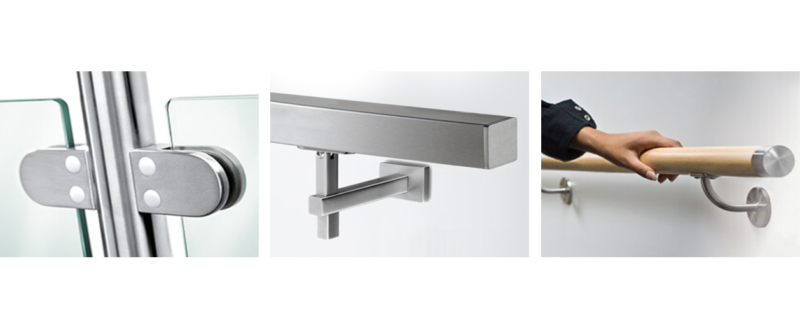 Close-up of modern door hardware, including a sliding glass door latch, a wall-mounted door pull, and a person holding a wooden handrail.