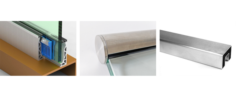 Close-up of architectural or construction materials, including glass, metal, and possibly a thermal or insulation panel.