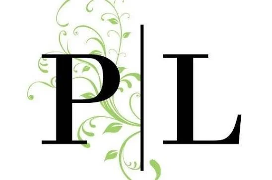 The word 'PIL' written with a black vertical line separating the letters, and green decorative floral design in the background.