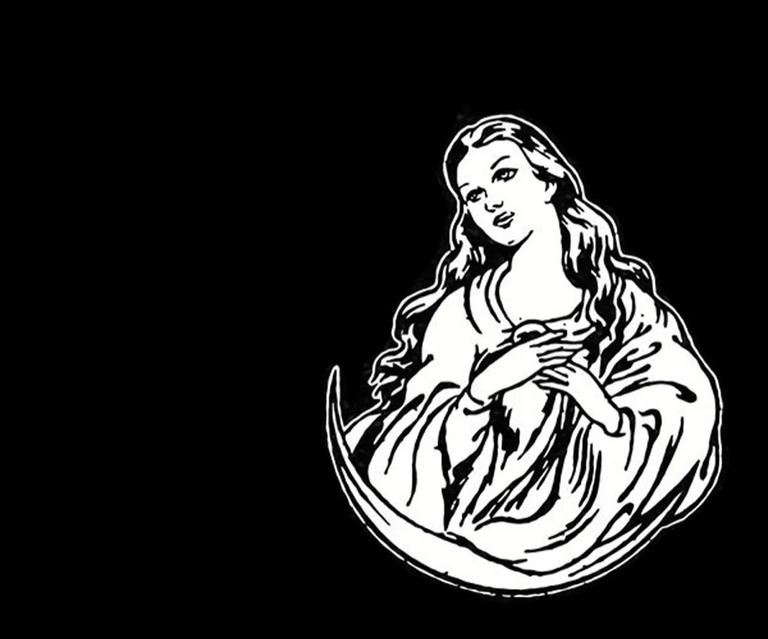 Lápida en granito negro  grabada mediante la técnica de chorro de arena imagen de Virgen. Obra artesanal realizada con precisión por el escultor Raúl Abad en nuestro taller de Alfara del Patriarca (Valencia).