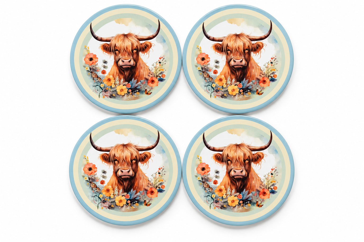 Four Highland cow floral ceramic coasters.png